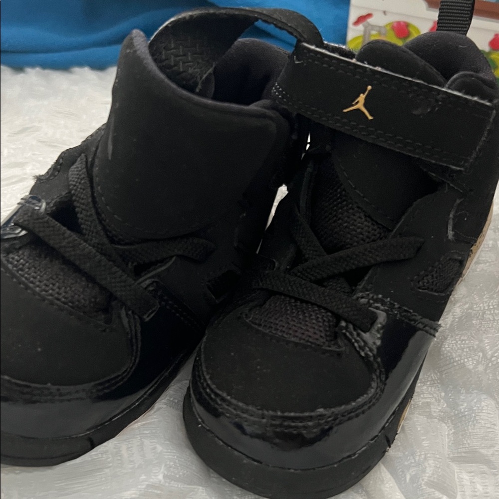Jordan Kids Black and Gold Sneakers